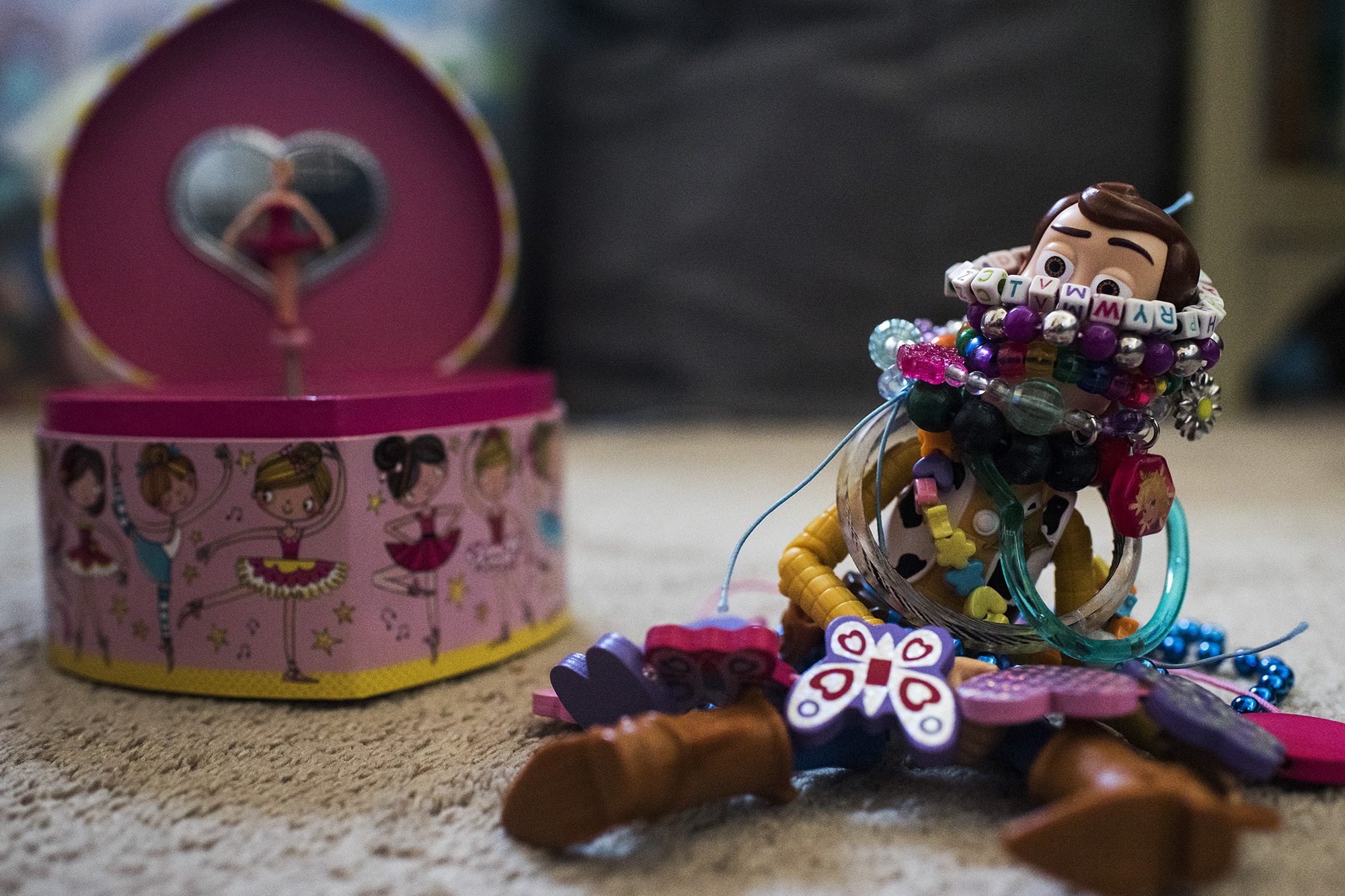 Woody in toy jewelry - Documentary Family Photography
